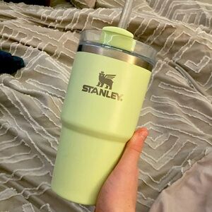 This is a 20 ounce Stanley cup neon green never used